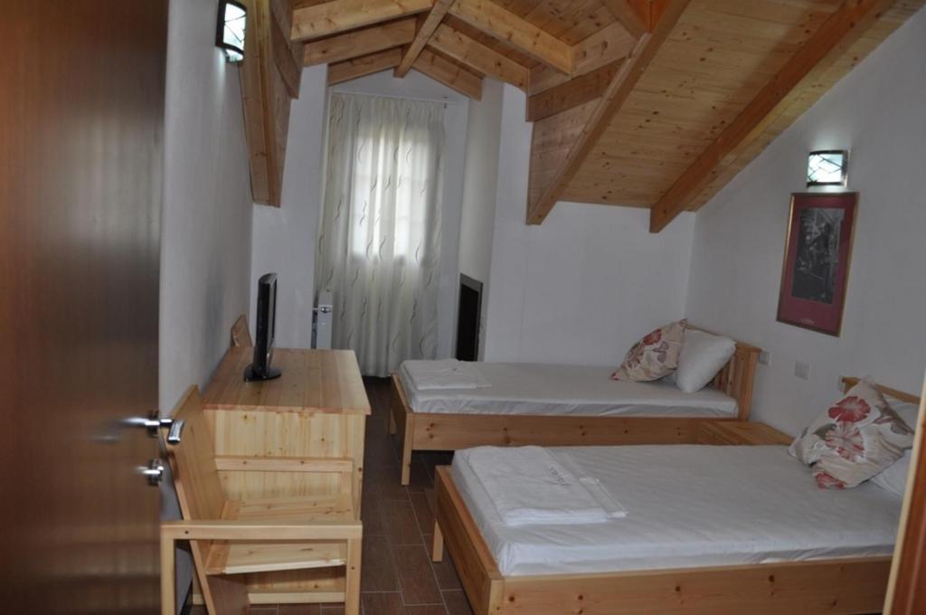 Hotel Marub Rubik Quarto foto